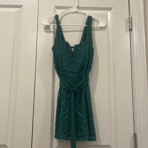Show me your mumu emerald green cocktail dress.